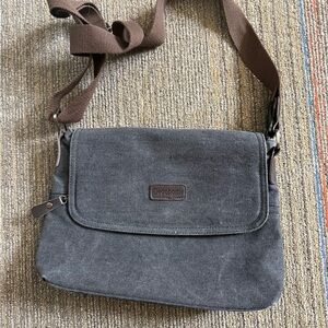 Grey messenger style bag